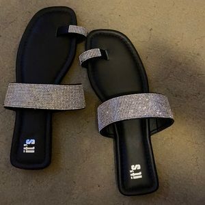 Black rhinestones sandals.